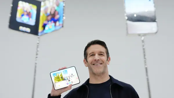 Apple iPhone Duo Debuts Amidst Market Jitters