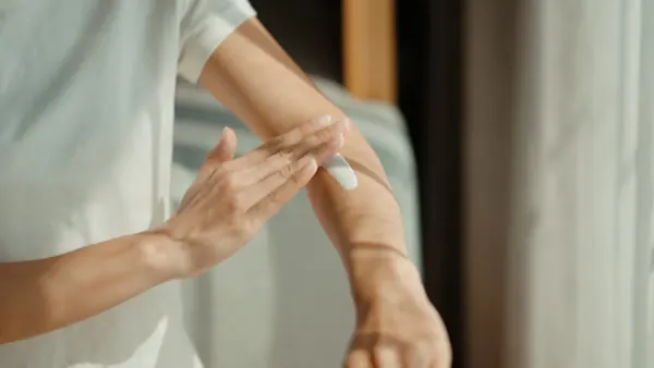 Doctor Explains Why Sunscreen Indoors is Essential for Skin Health